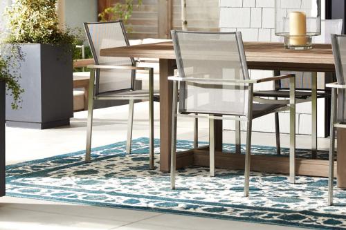 Dining table and chairs on a rug Dining table and chairs on a rug